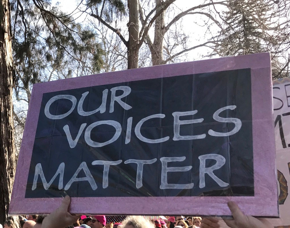 "our voices matter" sign at protest